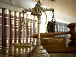 civil attornfy law books with scales in front
